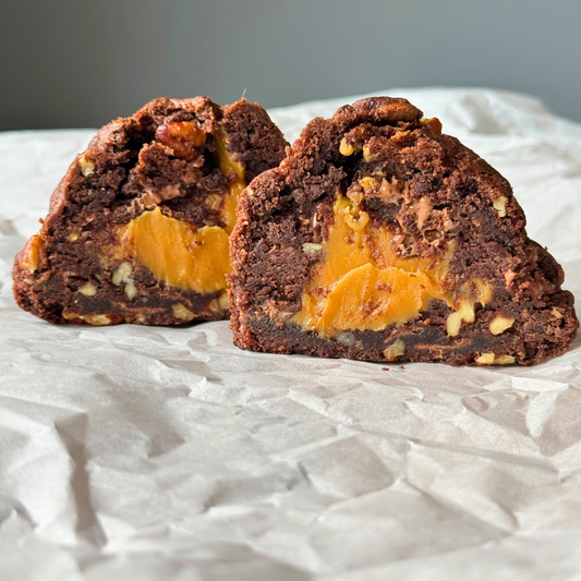 Dulce Pecan cookie filled with dulce de leche and roasted pecans – dark chocolate cookie by Brebow in Apple Valley, MN